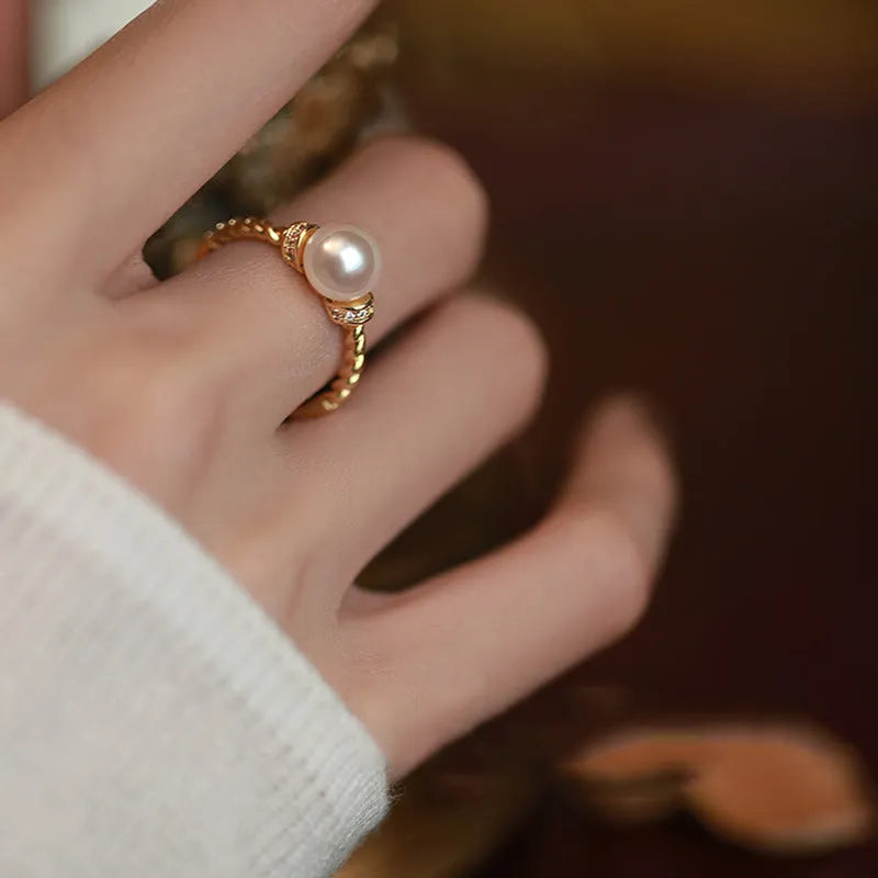 Adjustable copper ring with geometric pearl inlay in antique twist design