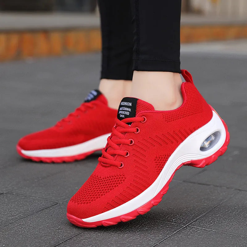 Women's red and black mesh sneakers with round toe and front lace-up design showing 3-5cm mid heel