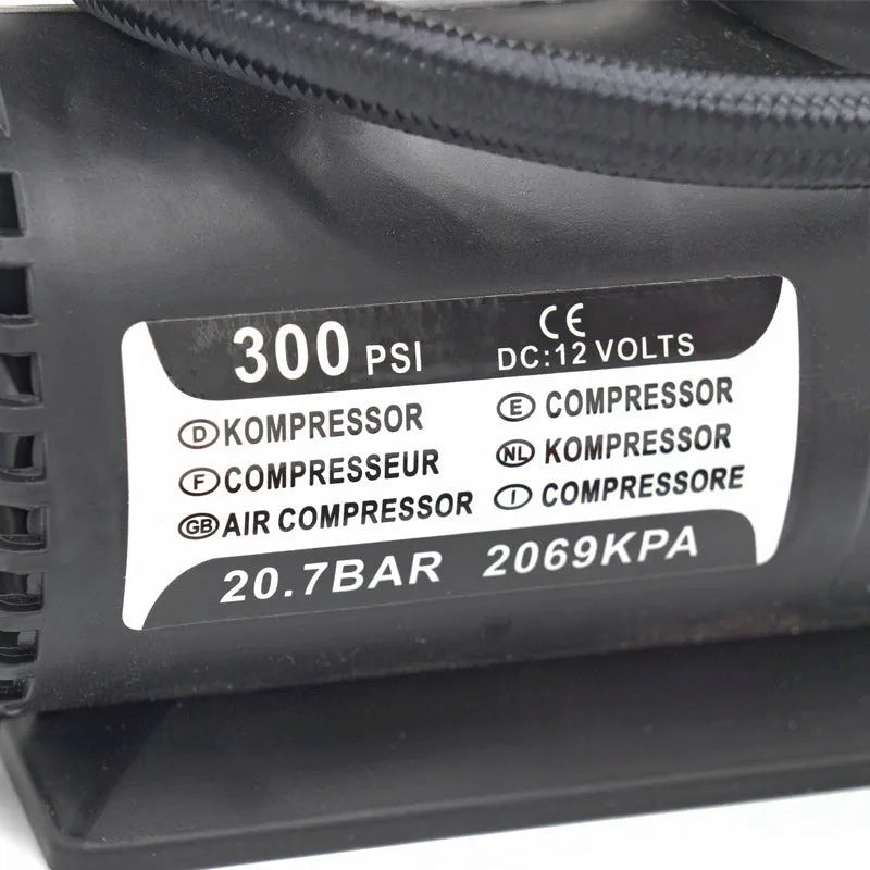 Mini 12V car air compressor in black with pressure gauge and 9-foot cord