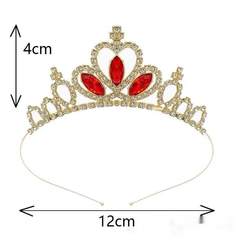 Gold tone alloy princess crown headdress with red coloured diamond accents for girls.