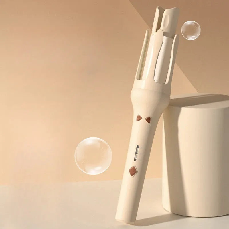 Automatic hair curler in a choice of colours with a 32mm barrel and international plug adapter.