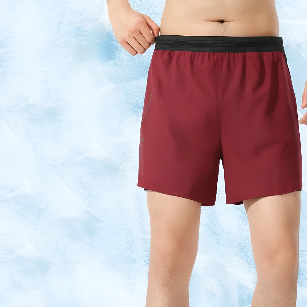Men's solid colour polyester basketball shorts with a low-waist design, shown in multiple colour options.