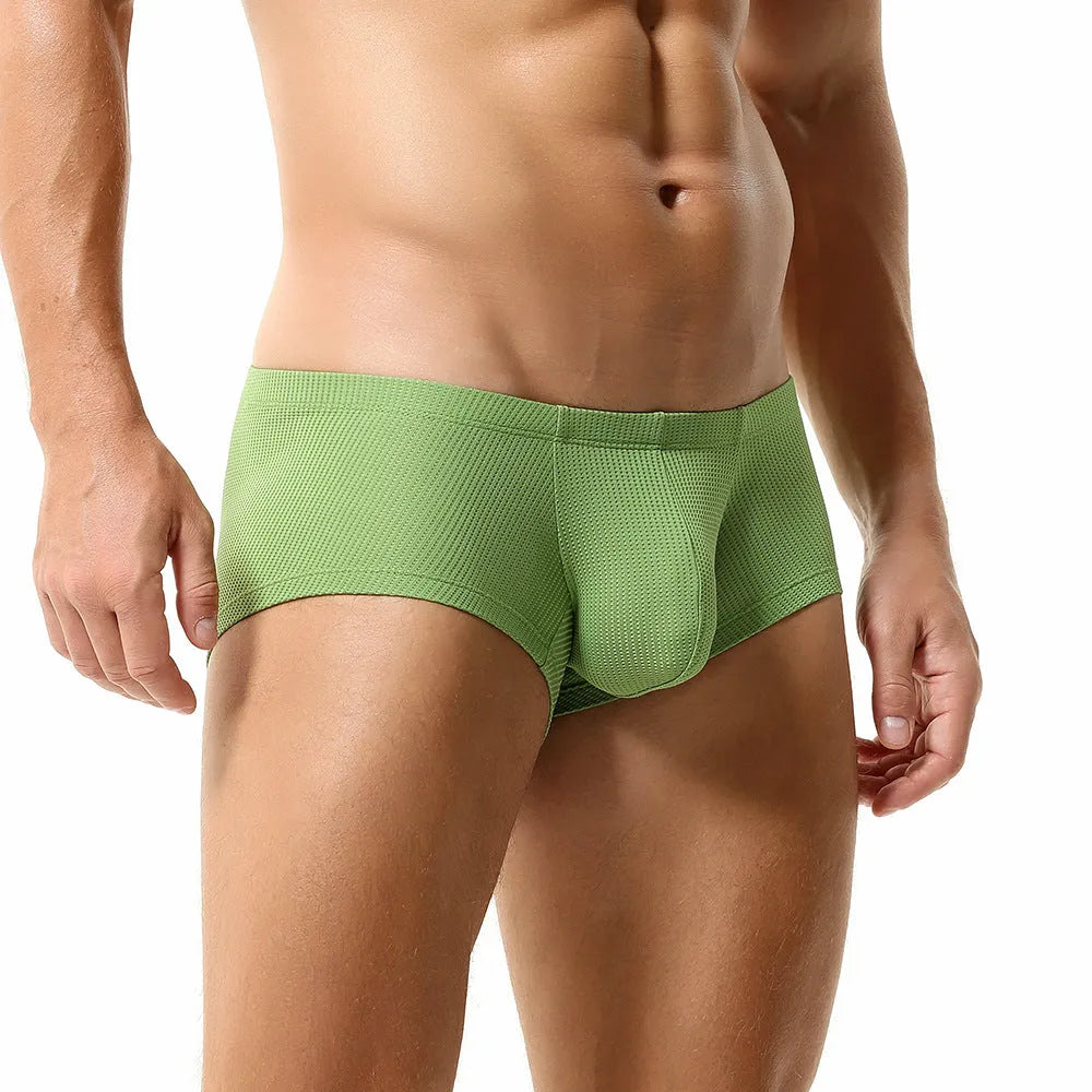 Men's solid colour nylon mid-low waist boxer shorts in orange, cloud blue, green, light blue, and milky white