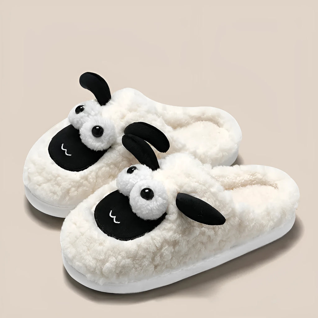 Brown slip-on slippers with suede upper and PVC sole shown on a plain background