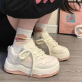 Women's casual platform sneaker in patent artificial PU, round toe lace-up design, rubber sole, green and pink colours