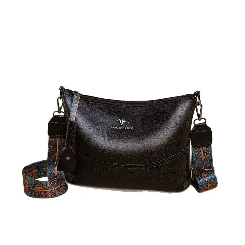 Women's bucket bag in PU leather, crossbody style, outer pocket, black colour, horizontal square shape