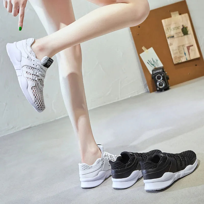 Low-top casual sneaker with hollow breathable mesh upper and round toe in a white net colour variant.
