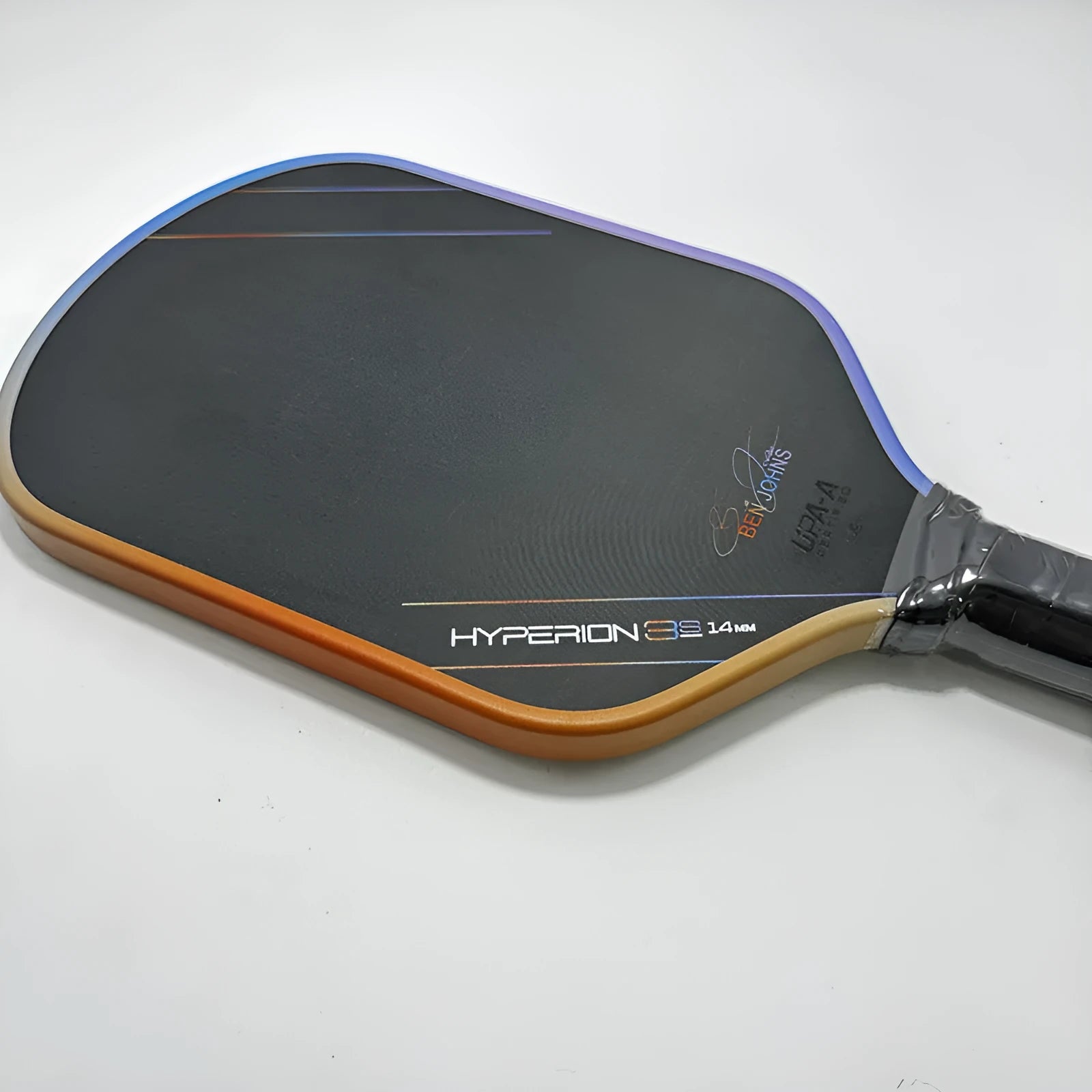 Aurora Hyperion 3s pickleball racket with multi-colour pattern on matte carbon fibre, showing full paddle dimensions.