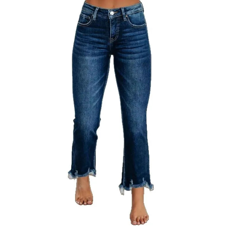 Women's solid colour denim jeans in dark blue and light blue, showing casual fit and hand-worn texture.