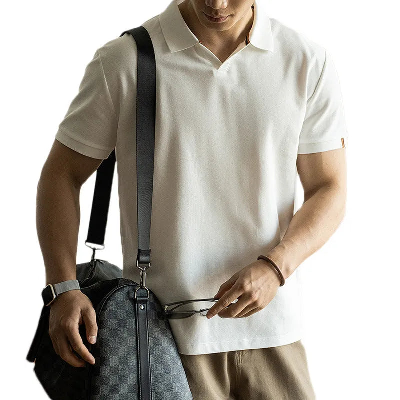 Blue cotton blend polo shirt with short sleeves displayed front view