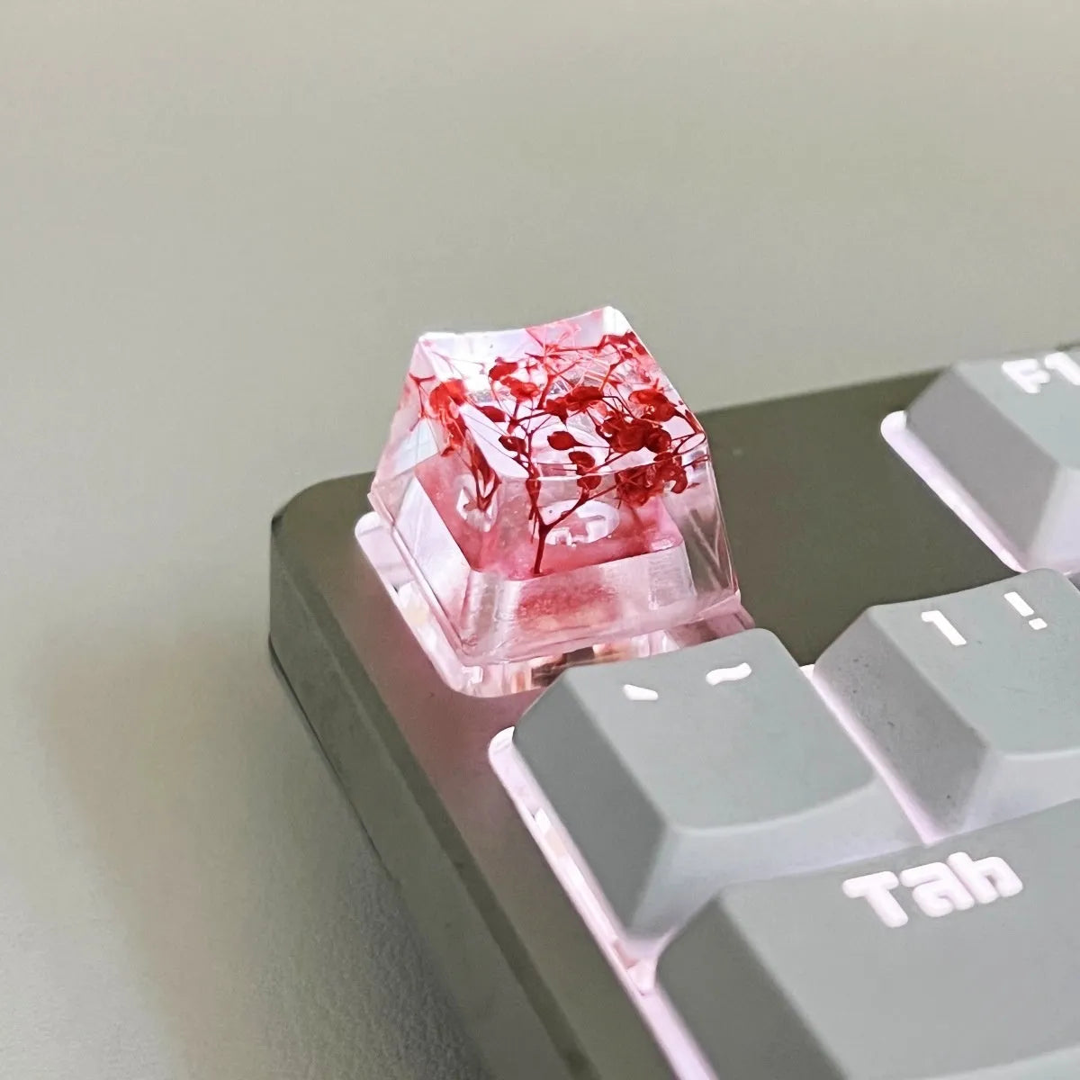 Transparent resin mechanical keyboard keycap showing starry sky galaxy design in multiple colour options
