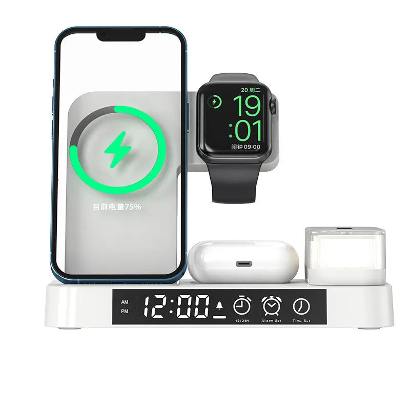 4-in-1 wireless charger station with alarm clock display and foldable stand charging a phone, headphones and watch