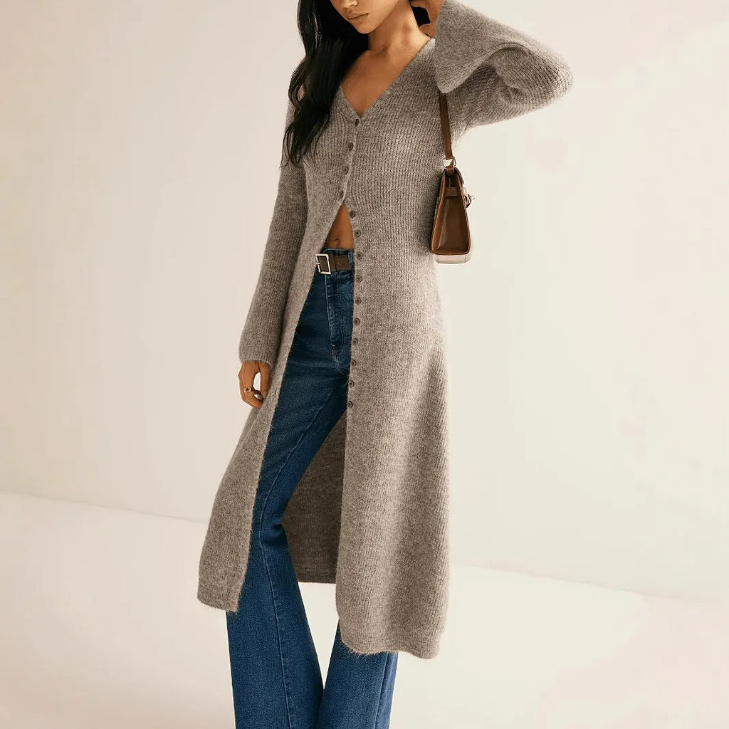 Retro French style long sleeve cardigan coat in khaki with button front on a woman, soft acrylic and viscose blend