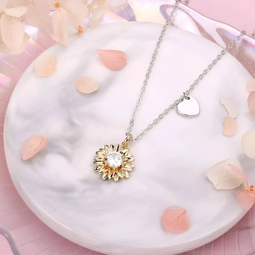 Women's sunflower-themed 925 silver pendant necklace with geometric petals on an adjustable cross chain.