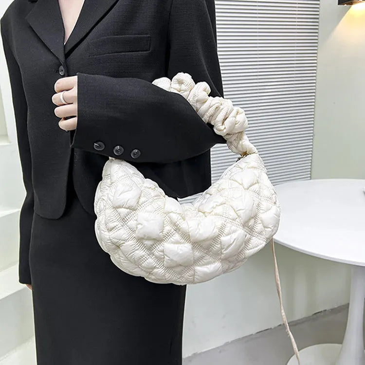Women's nylon cloud underarm bag in beige colour with adjustable shoulder strap