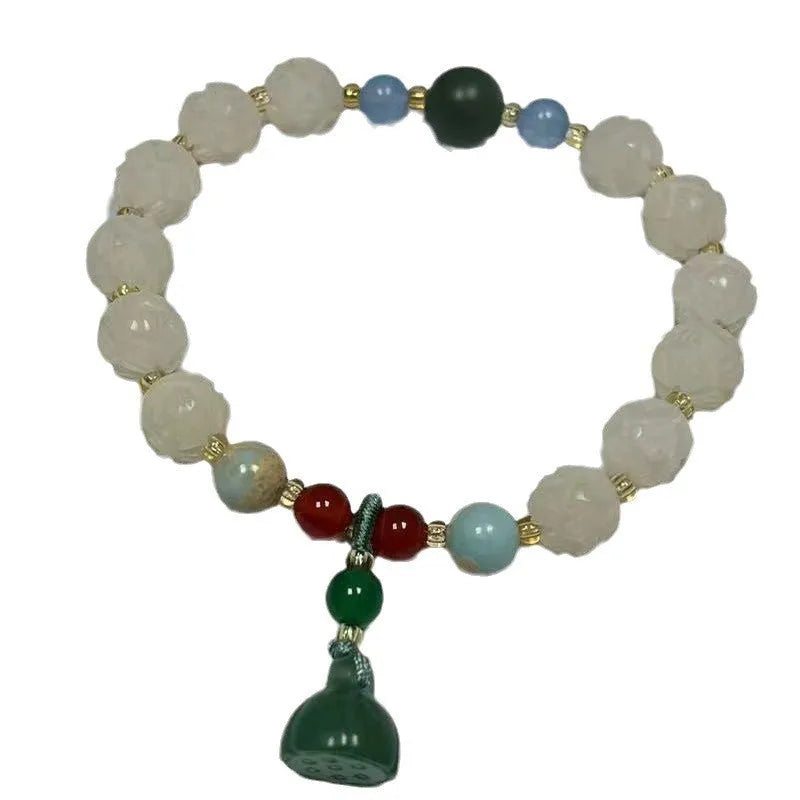 Hand-carved bodhi root bracelet with pumpkin lotus beads, white jade accents, and cat claw pendant