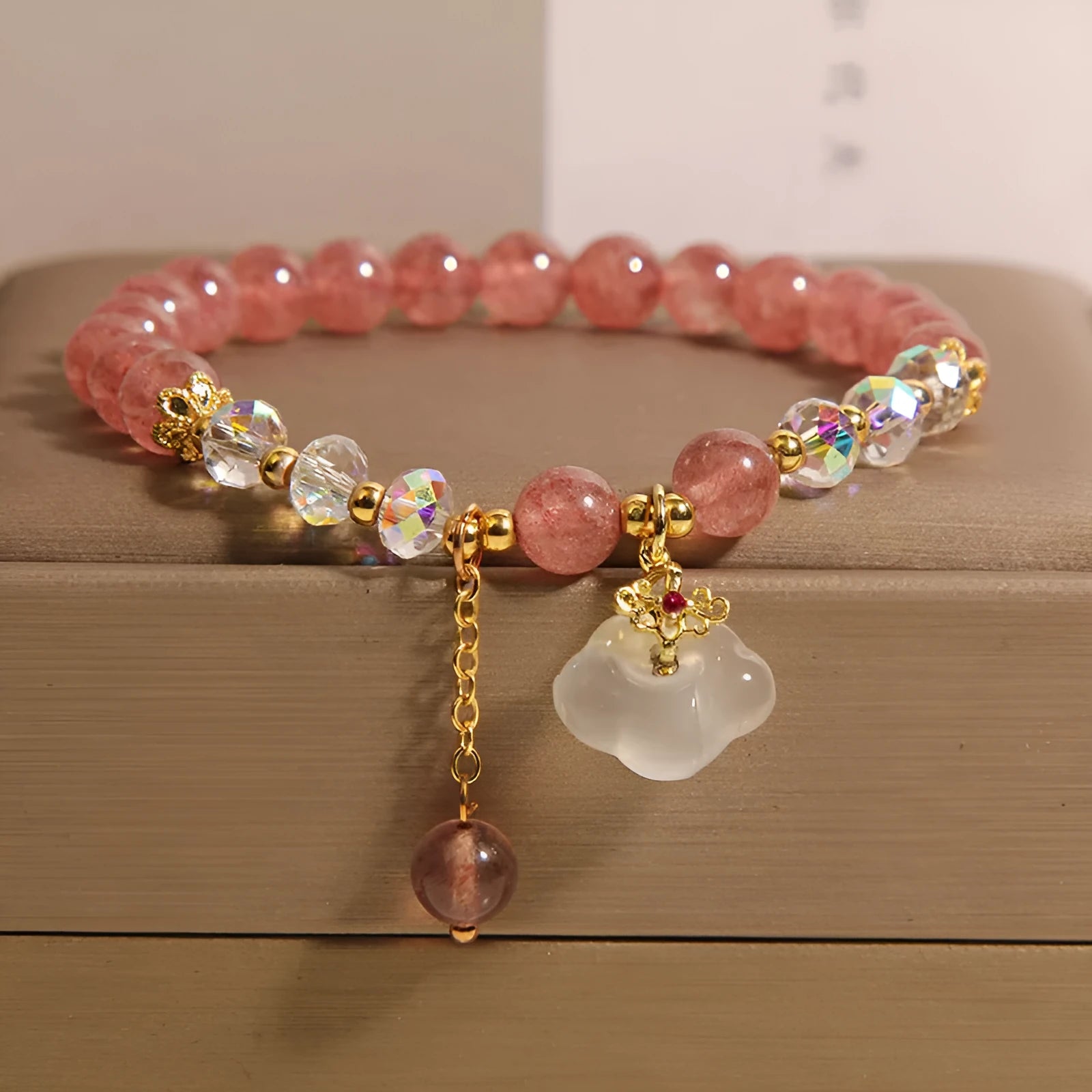 Women's natural strawberry quartz white agate crystal bracelet with auspicious cloud carvings on stretch cord