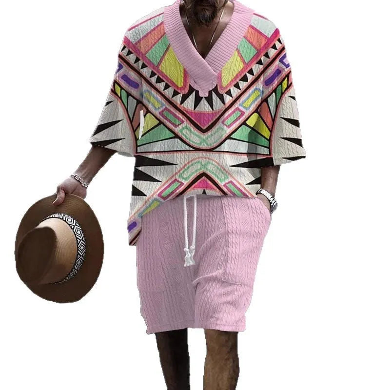 Man wearing a loose blue short sleeve casual suit top and matching shorts.