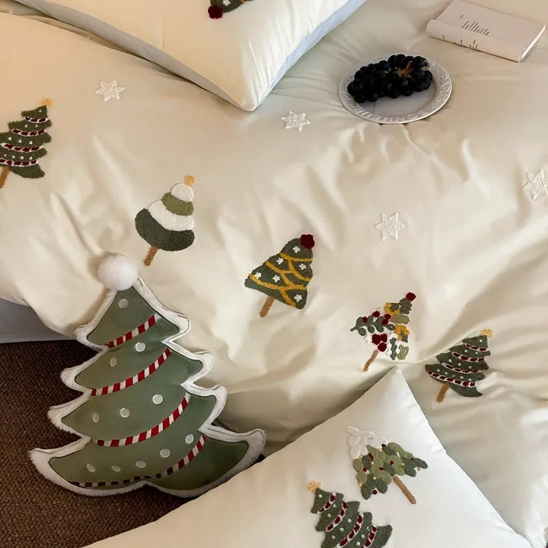 Pure cotton bedding set with embroidered Christmas tree pattern in cream blue or green, showing duvet cover, sheet, and pillowcases.