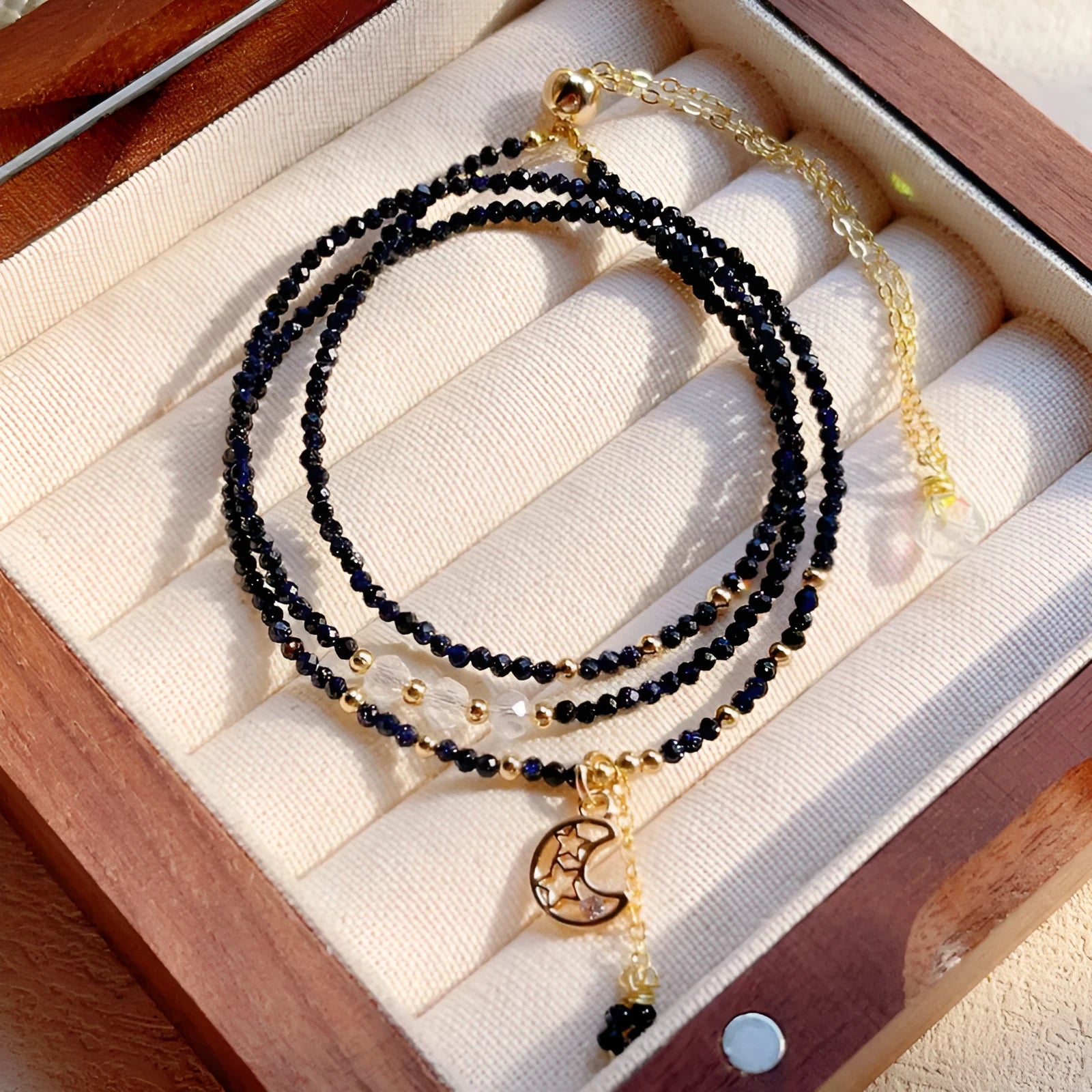 Blue sand stone three-ring women's bracelet showing layered construction and textured surface