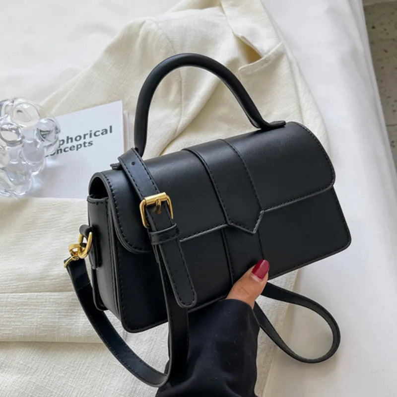 Women's beige messenger bag with horizontal square design showing external pockets and 22cm width