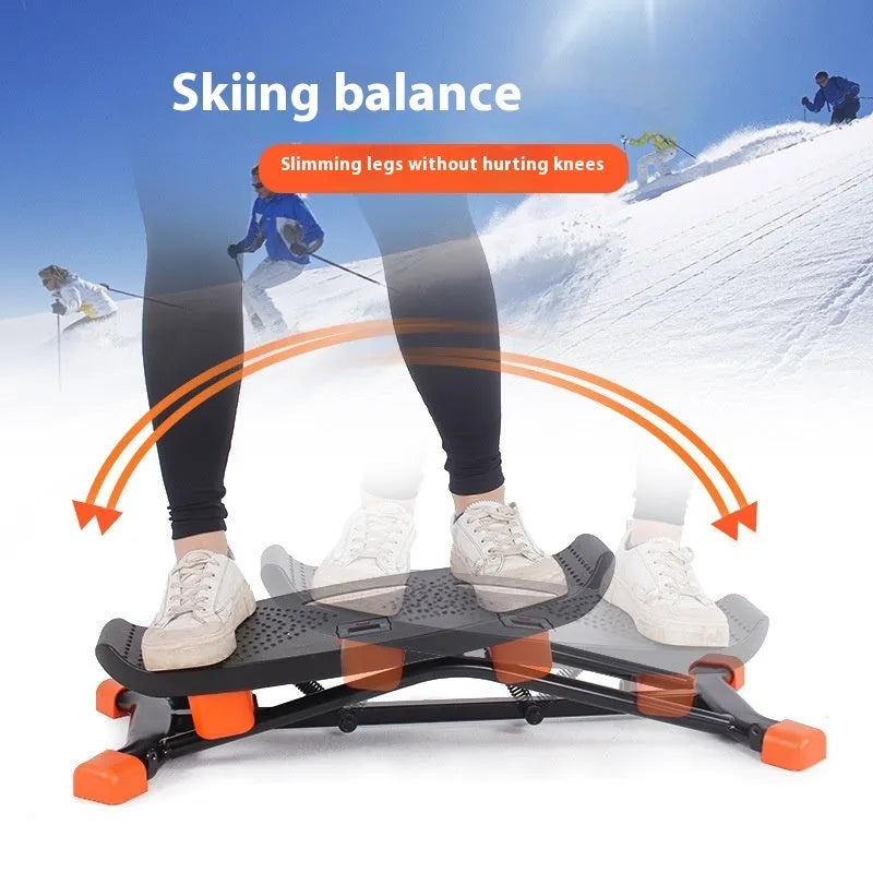 Black JS101A mini fitness skiing machine with elastic hand straps on a home floor