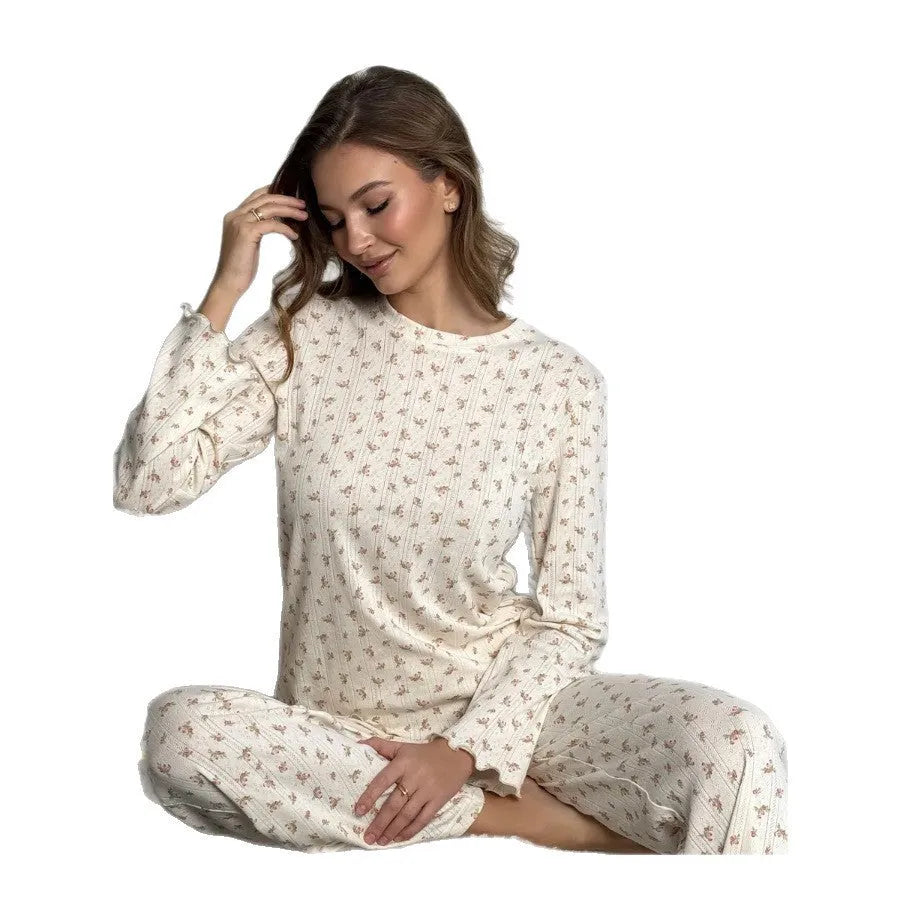 White floral print women's loungewear suit with bell sleeve top and wide-leg trousers
