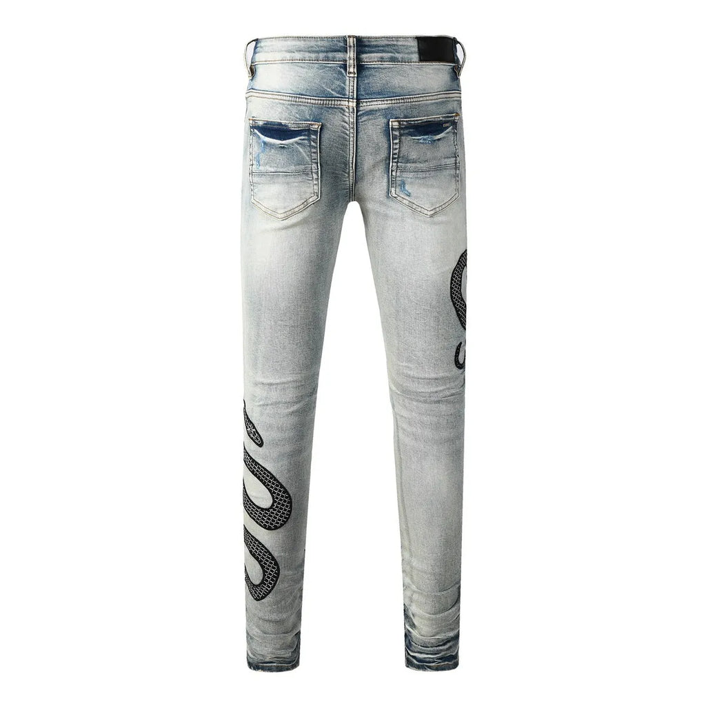 Women's blue distressed skinny jeans with mid-waist fit and button fly detail
