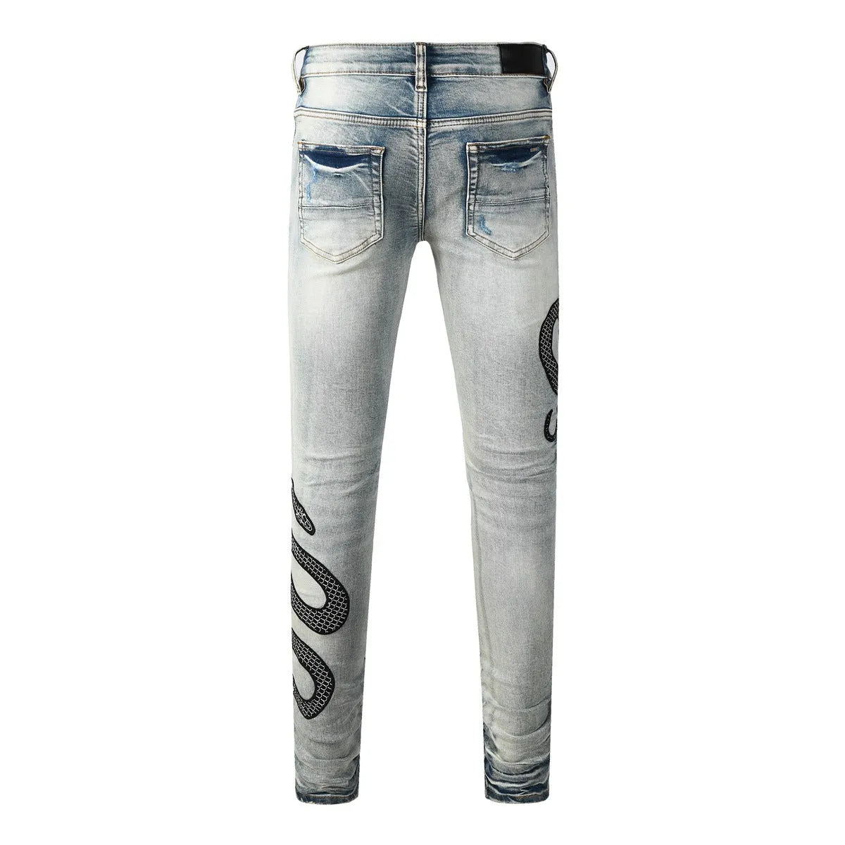 Women's blue distressed skinny jeans with mid-waist fit and button fly detail