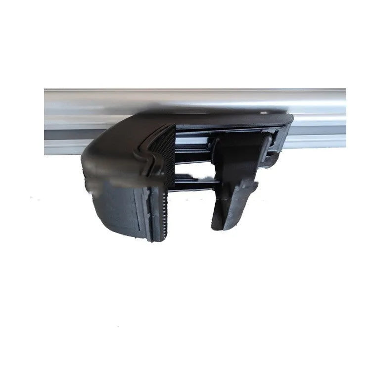 Alloy roof rack crossbars for a General Motors SUV on a vehicle roof