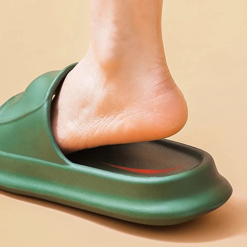 Pair of thick-soled EVA flip-flop slippers in a chosen colour, showing the non-slip patterned sole.