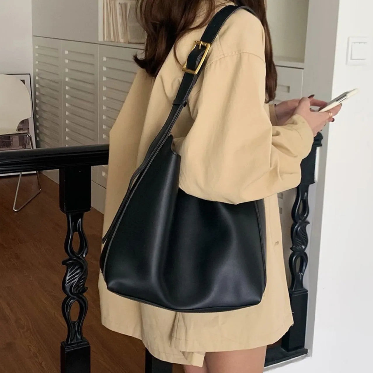 Women's soft PU leather shoulder bag with swinging thread decoration in 28x32x12cm size