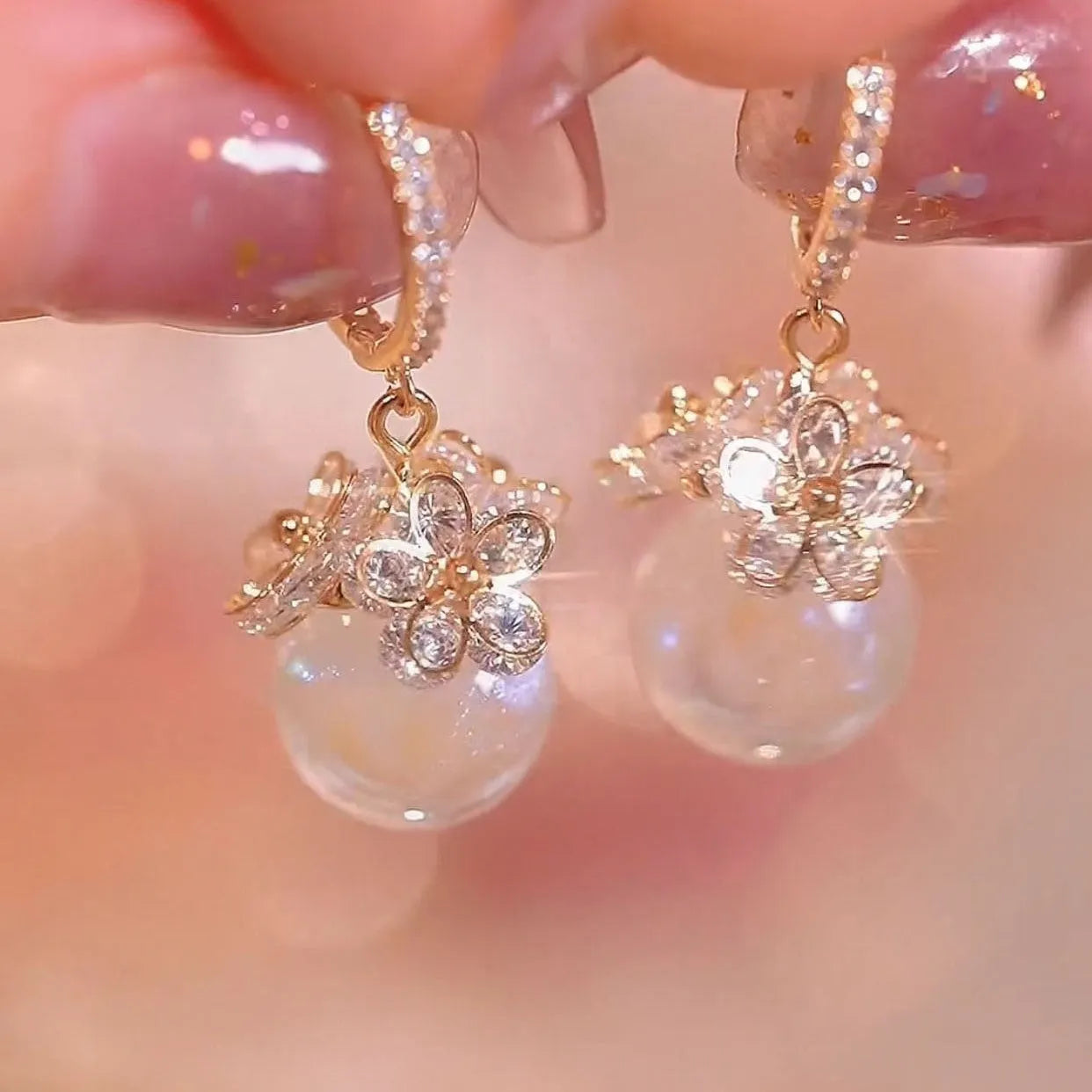 Geometric copper zircon earrings with rose design elements in multiple colour variations