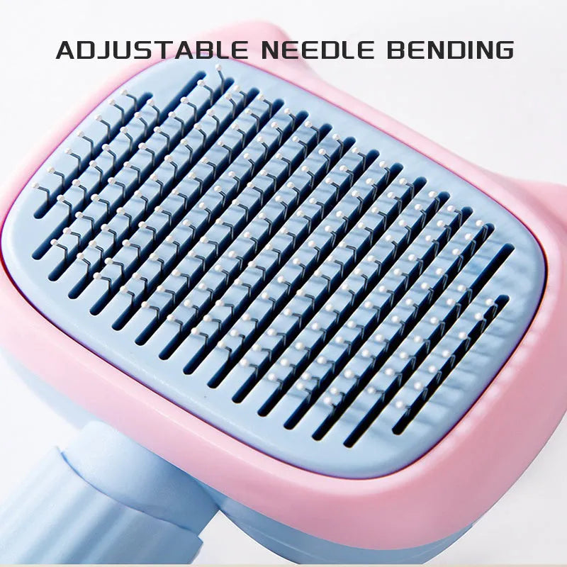 Red double-sided pet grooming brush with de-shedding rake and de-matting comb on a white background