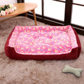 Plush sofa-style dog bed with raised sides in beige colour for small dogs