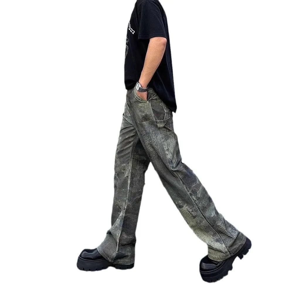 Men's straight leg jeans with a retro digital camouflage print on blue denim fabric.
