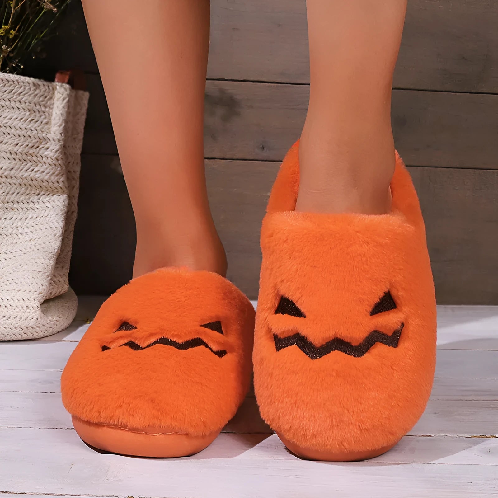 Orange Halloween pumpkin design plush slippers with coral velvet upper and flat PVC soles
