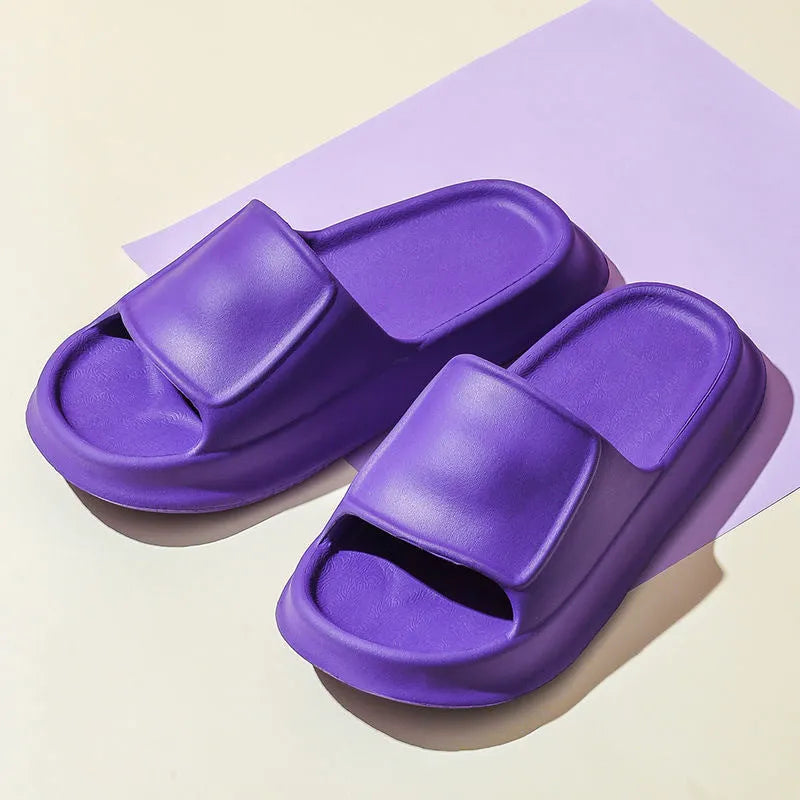 Pair of thick-soled EVA flip-flop slippers in a chosen colour, showing the non-slip patterned sole.