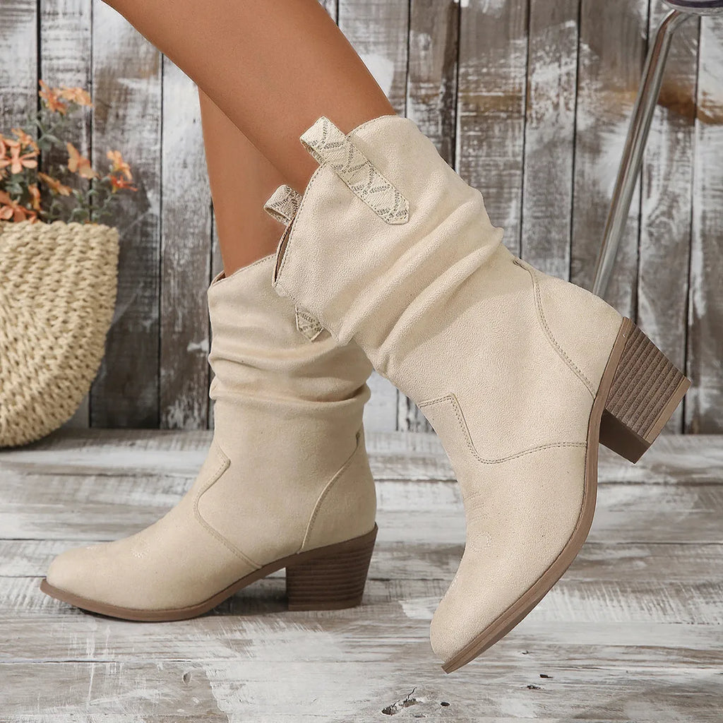 Plus size women's suede mid-calf boot with mid heel on a white background.