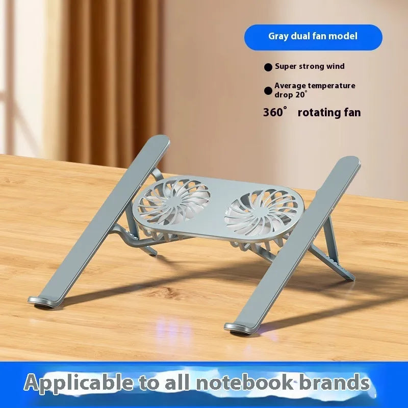 Aluminium alloy notebook stand with twin fans, silver finish, on a desk with a laptop placed on top