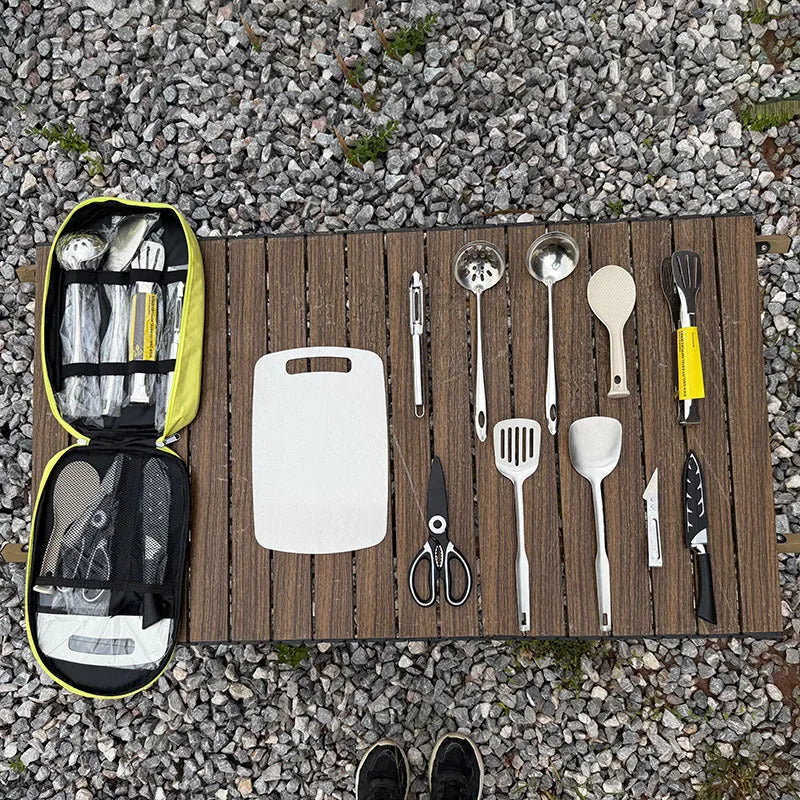 Portable picnic bag containing a 12-piece stainless steel kitchenware set.