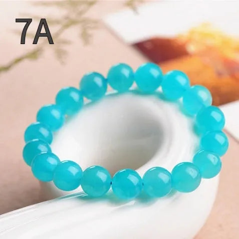 Grade 7A Amazonite scattered beads in ice colour with polishing treatment, showing natural gemstone variations
