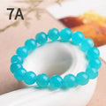 Grade 7A Amazonite scattered beads in ice colour with polishing treatment, showing natural gemstone variations