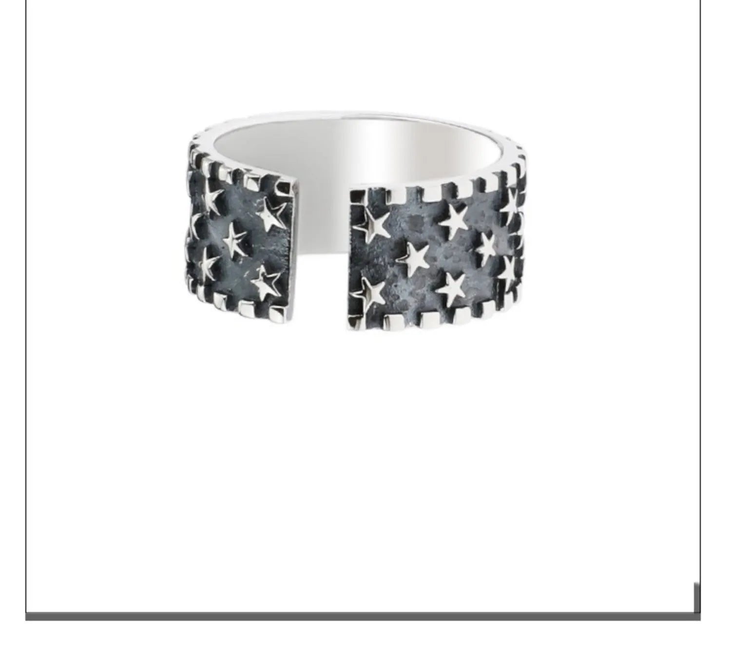 Adjustable open band sterling silver ring with a geometric five-pointed star design.
