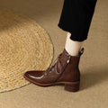 Women's black pointed-toe ankle boots with 5.5cm heel and 13cm shaft height