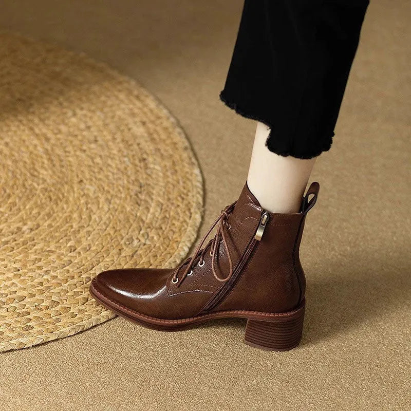 Women's black pointed-toe ankle boots with 5.5cm heel and 13cm shaft height