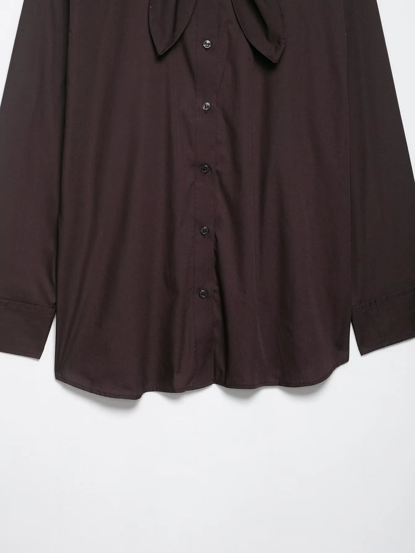 Women's brown loose-fit long sleeve poplin shirt with attached scarf bow tie, front view