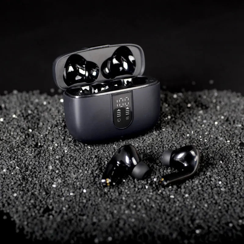 Jerry X08 wireless headphones with digital display showing pairing status and USB charging case