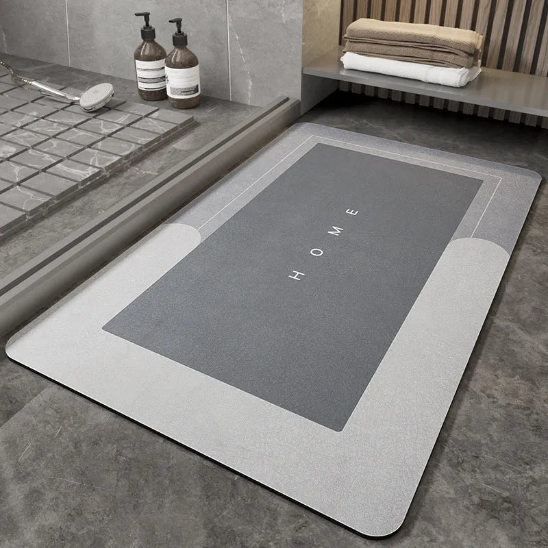 Blended fabric bathroom floor mat in Lake Baikal blue, shown in an oval shape on tiled flooring.