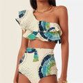 White women's one-shoulder swimsuit with lotus leaf design and high leg split